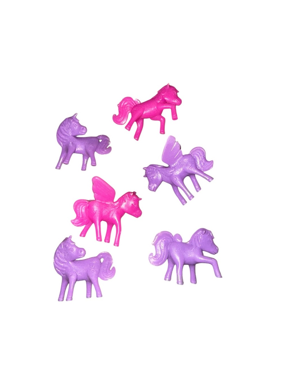 Vintage plastic pink and purple unicorns